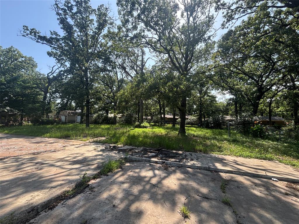 130 45th Street Southwest Paris, TX 75460 - Photo 5 of 9 a view of a park with tree s