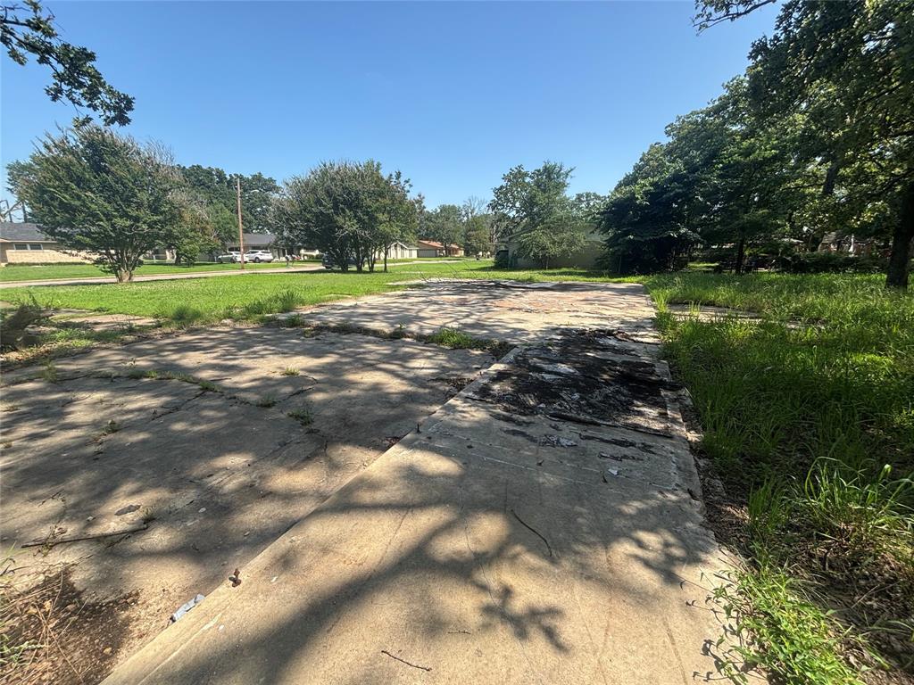 130 45th Street Southwest Paris, TX 75460 - Photo 6 of 9 a view of a park with large trees