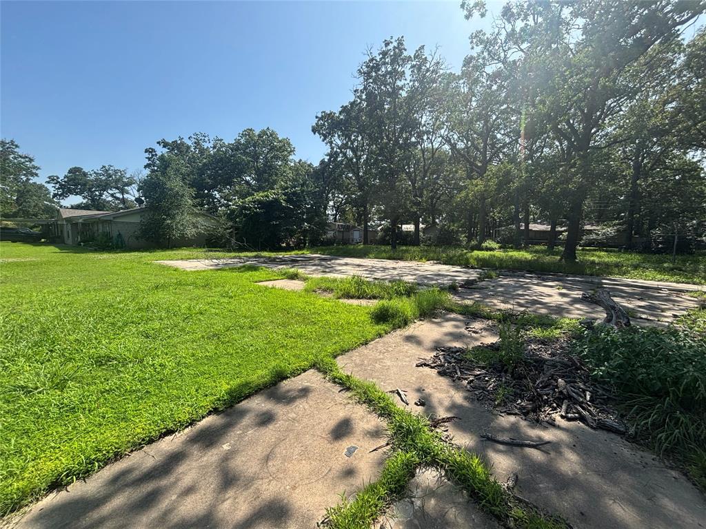130 45th Street Southwest Paris, TX 75460 - Photo 7 of 9 a view of a park with trees in the background
