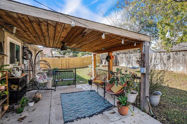 a view of a porch with furniture