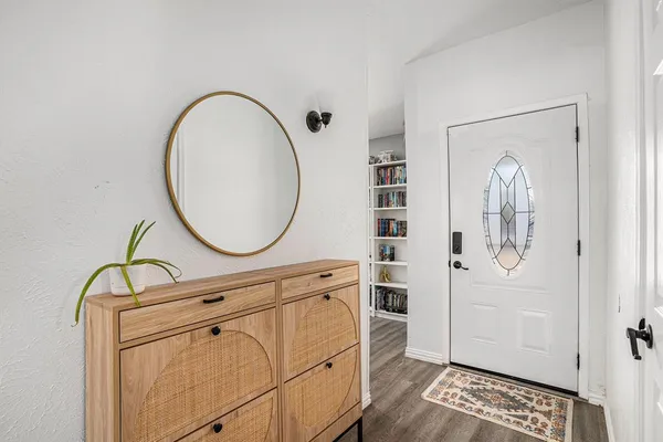 a bathroom with a mirror a sink and a mirror