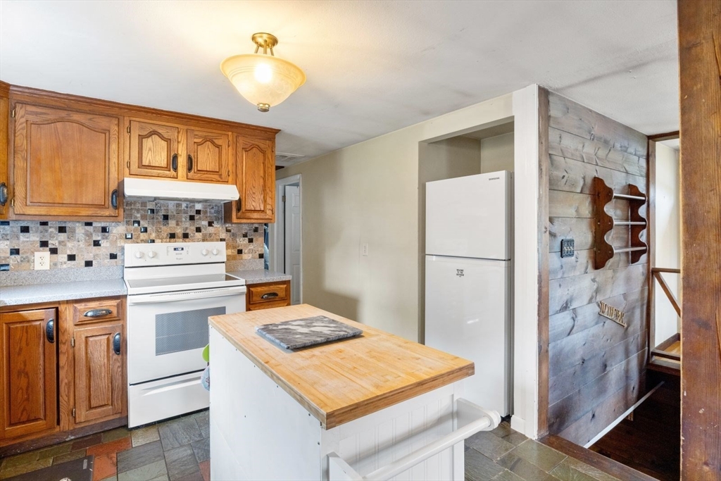 42 Wapping Road Kingston, MA 02364 - Photo 15 of 25 a kitchen with a stove a refrigerator and a stove