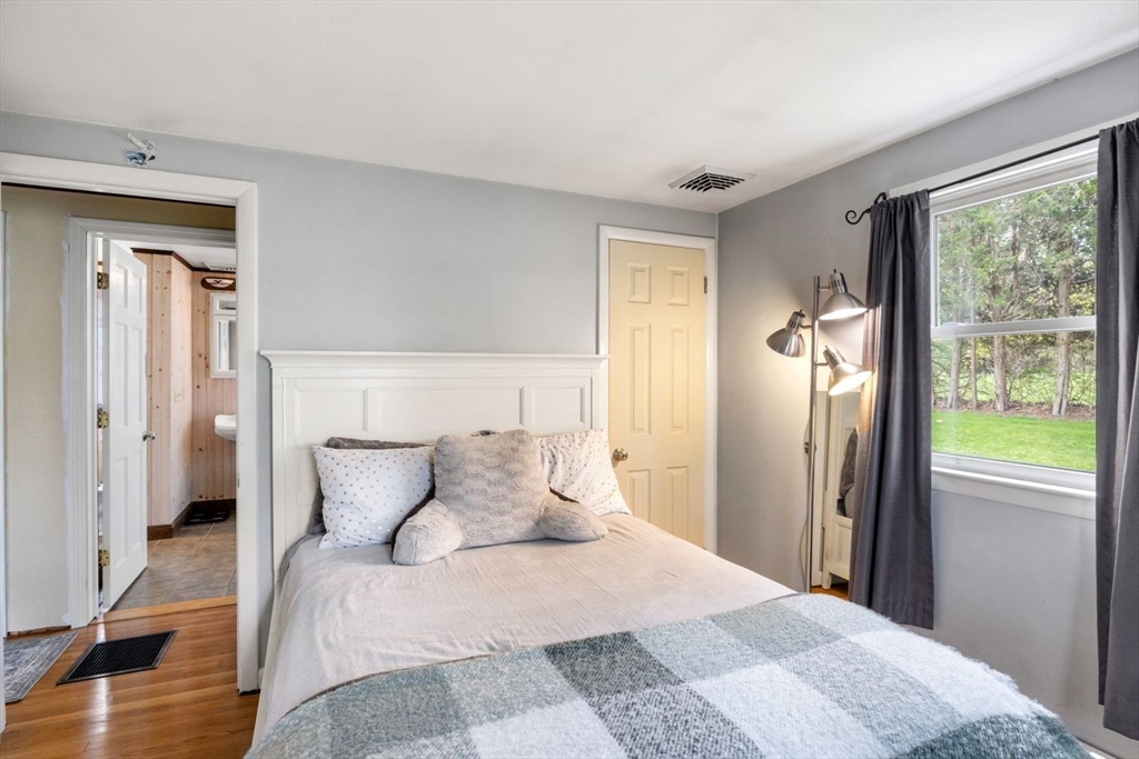 42 Wapping Road Kingston, MA 02364 - Photo 17 of 25 a bedroom with a bed and a window