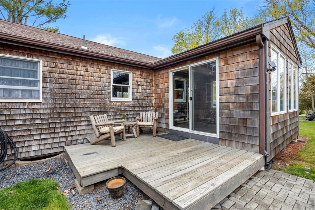 42 Wapping Road Kingston, MA 02364 - Photo 8 of 25 a backyard of a house with seating space