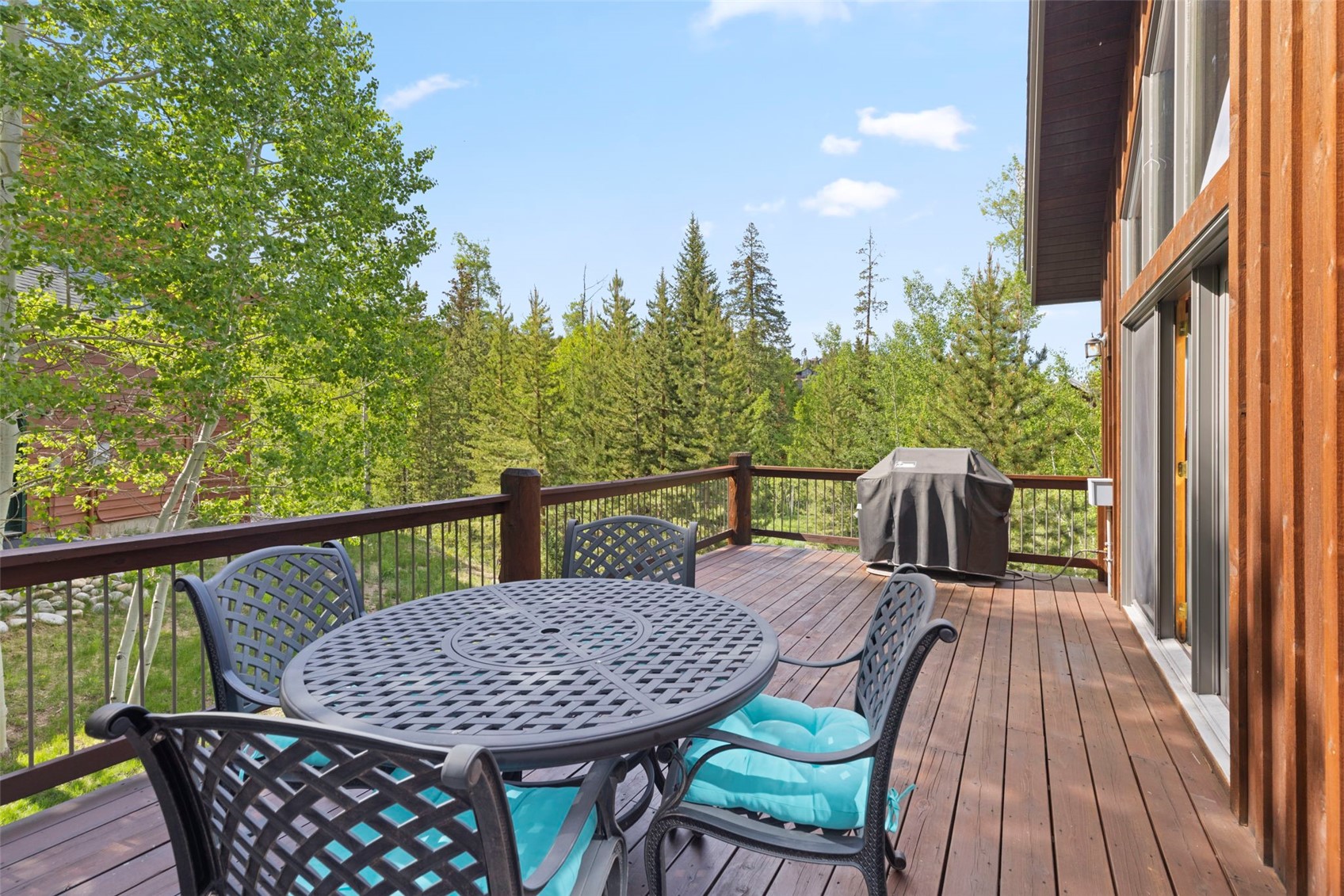 736 Wild Rose Road Silverthorne, CO 80498 - Photo 19 of 49 Deck featuring area for grilling and outdoor dining space