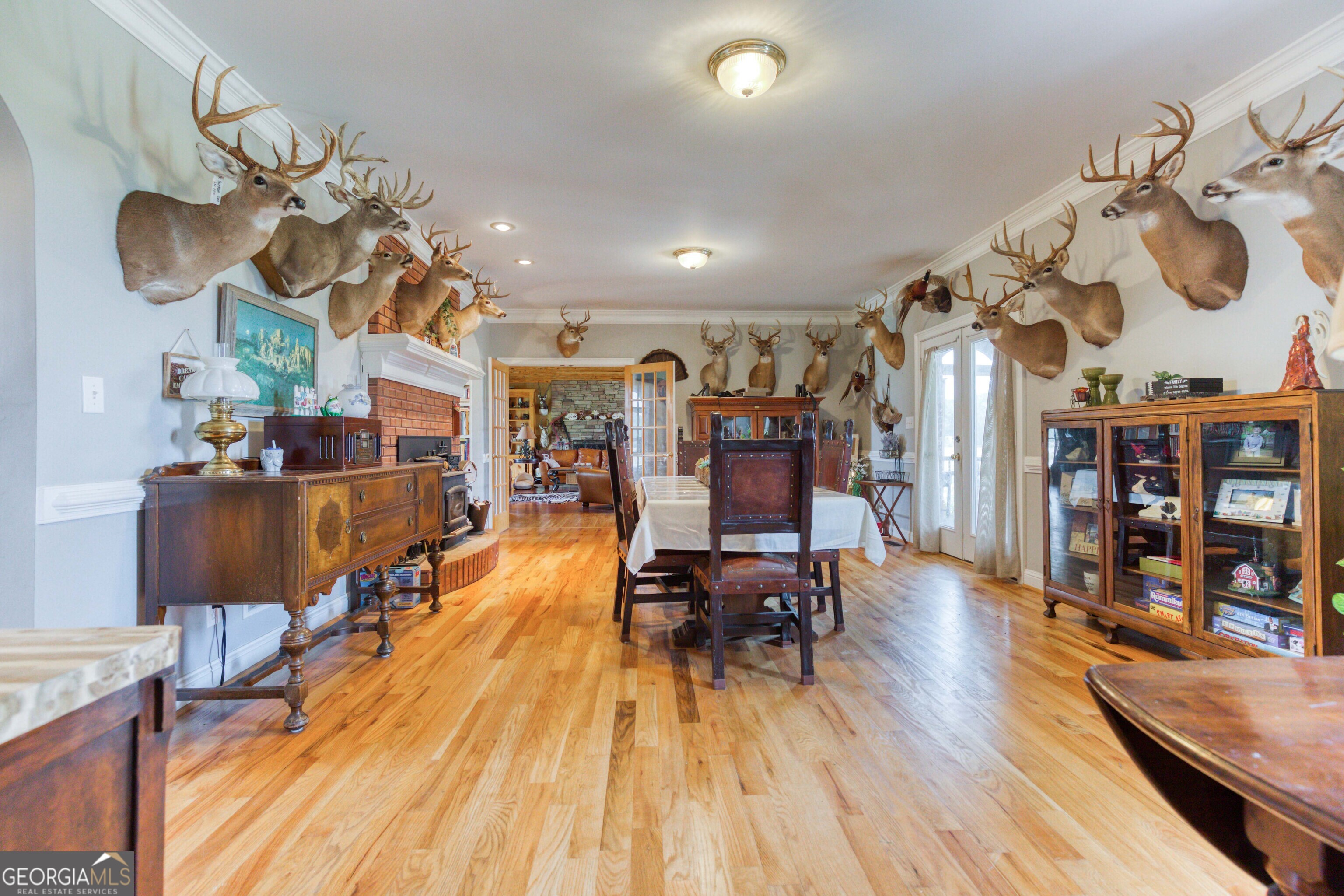 1811 Michael Road Northwest Monroe, GA 30656 - Photo 19 of 43 a view of a dining room with furniture and wooden floor