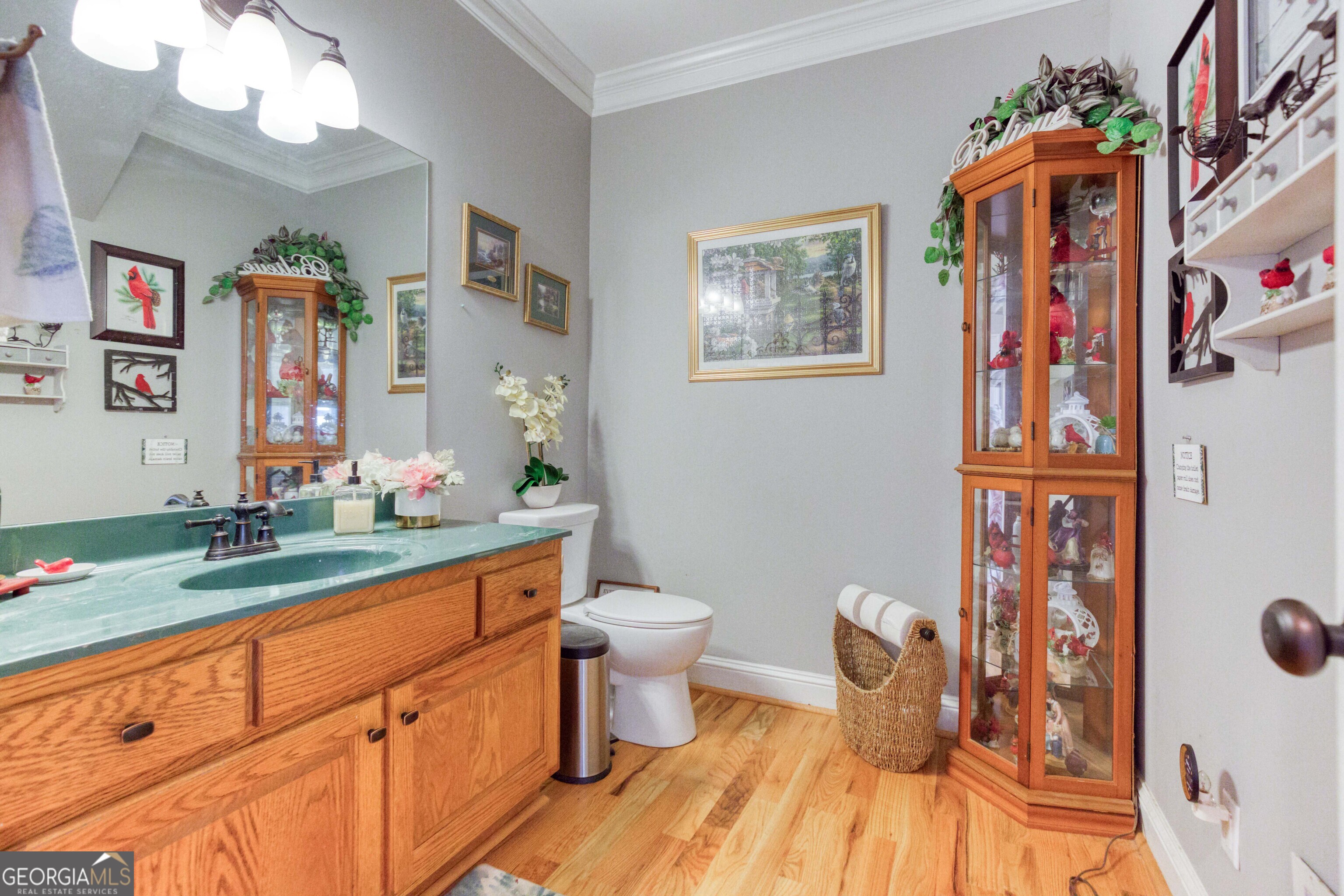 1811 Michael Road Northwest Monroe, GA 30656 - Photo 25 of 43 a bathroom with a granite countertop sink and a mirror