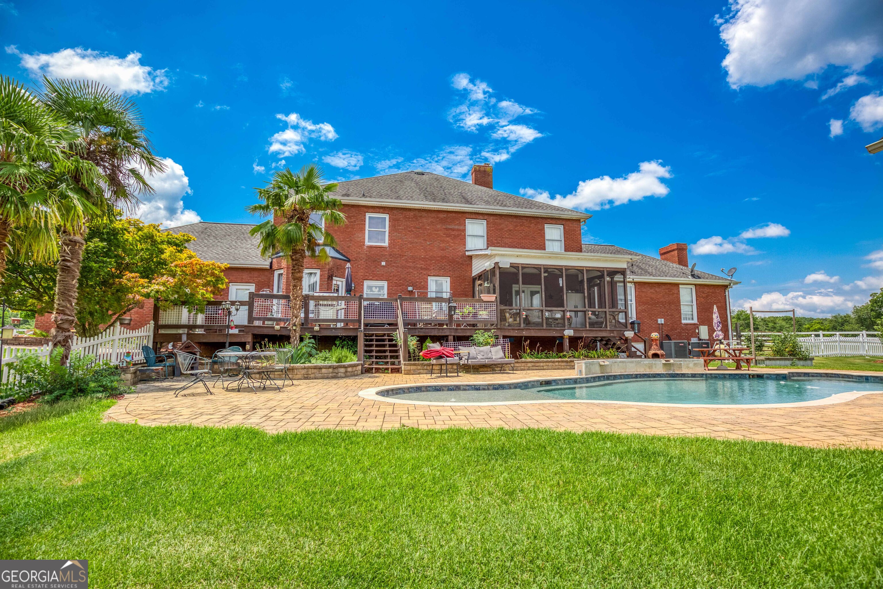 1811 Michael Road Northwest Monroe, GA 30656 - Photo 3 of 43 a view of a fountain the house and front of a house