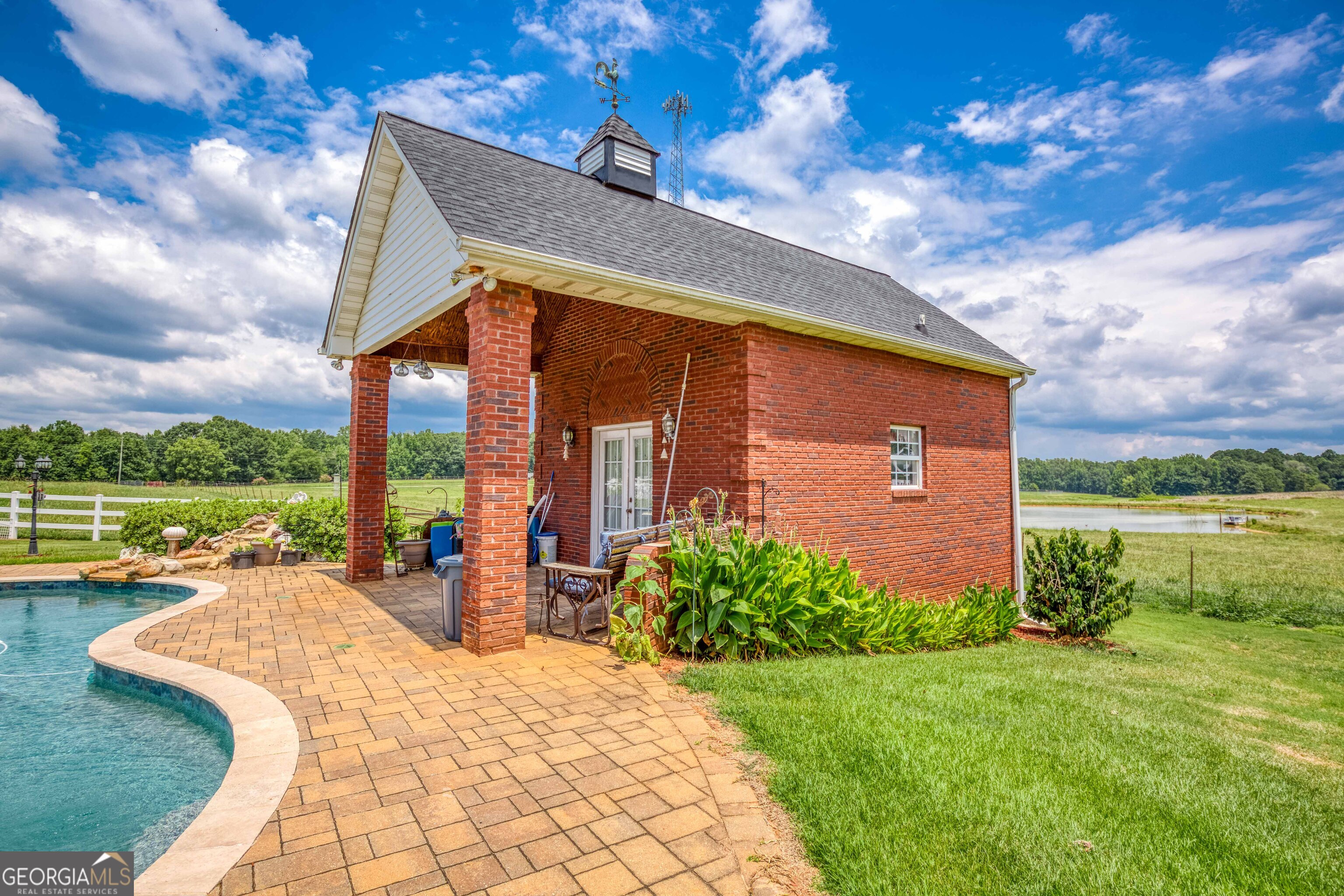 1811 Michael Road Northwest Monroe, GA 30656 - Photo 38 of 43 a front view of a house with garden