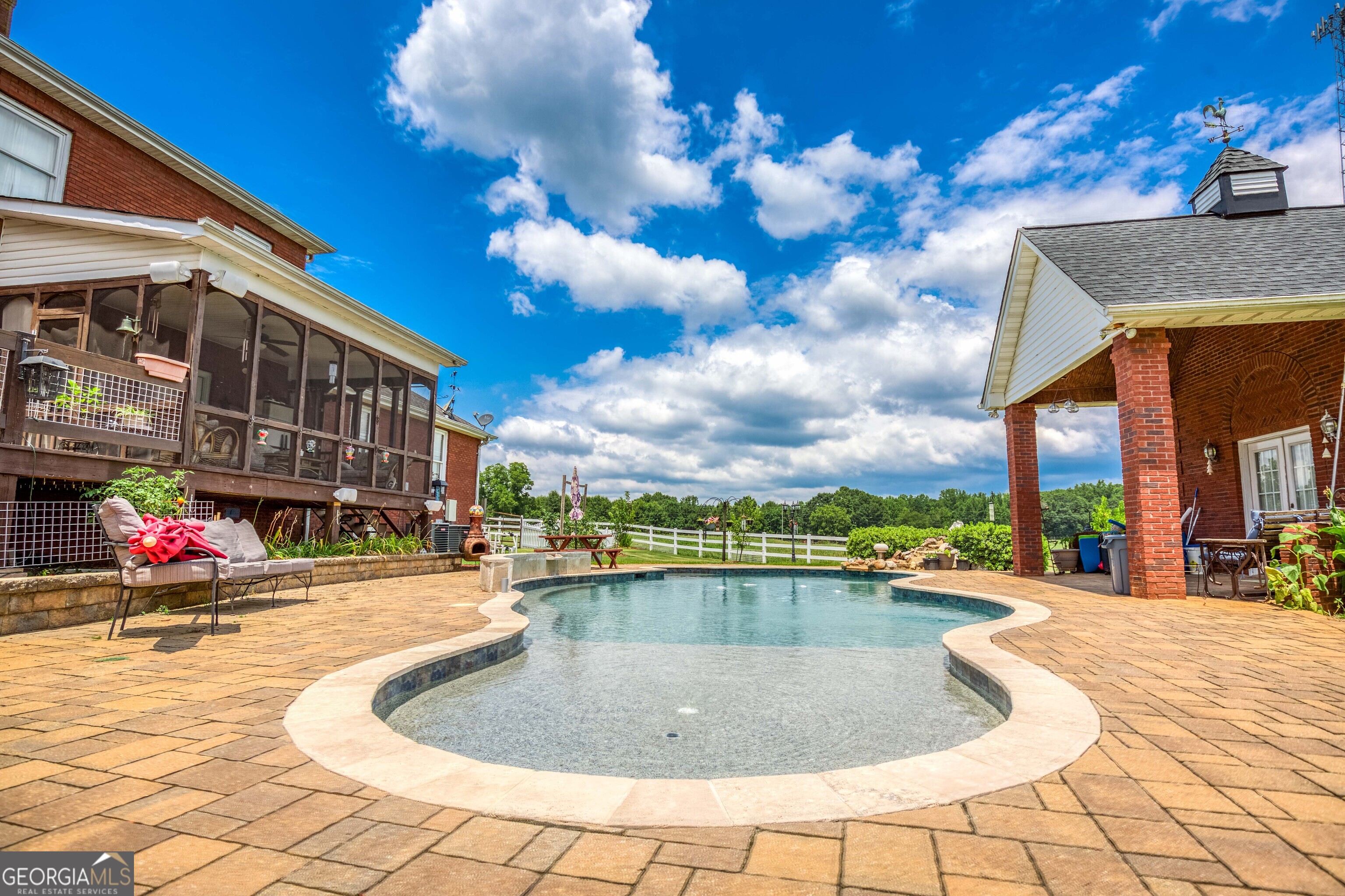 1811 Michael Road Northwest Monroe, GA 30656 - Photo 5 of 43 a view of a swimming pool with a lounge chairs