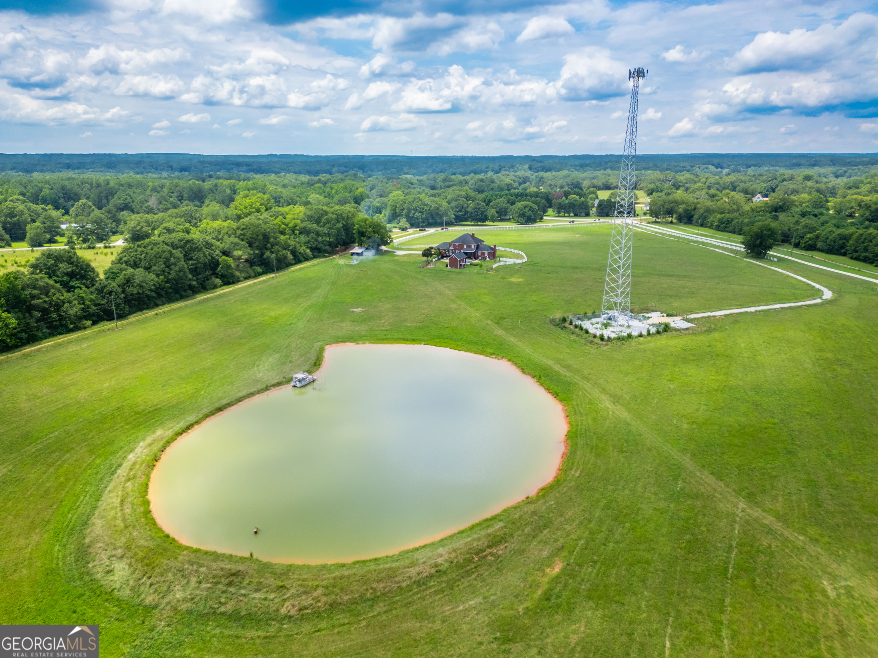 1811 Michael Road Northwest Monroe, GA 30656 - Photo 7 of 43 a view of a swimming pool with a yard
