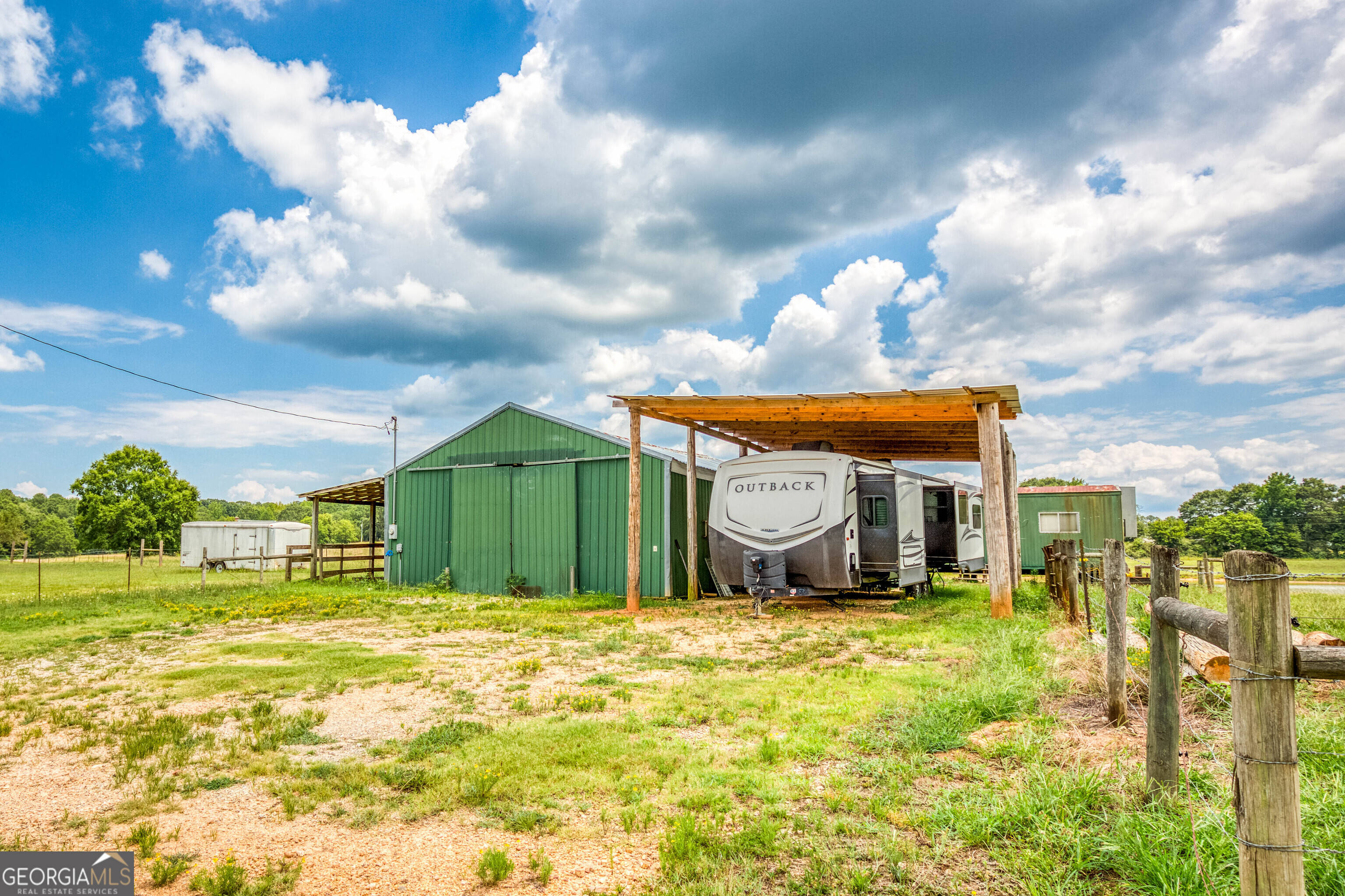 1811 Michael Road Northwest Monroe, GA 30656 - Photo 9 of 43 a view of a house with a yard