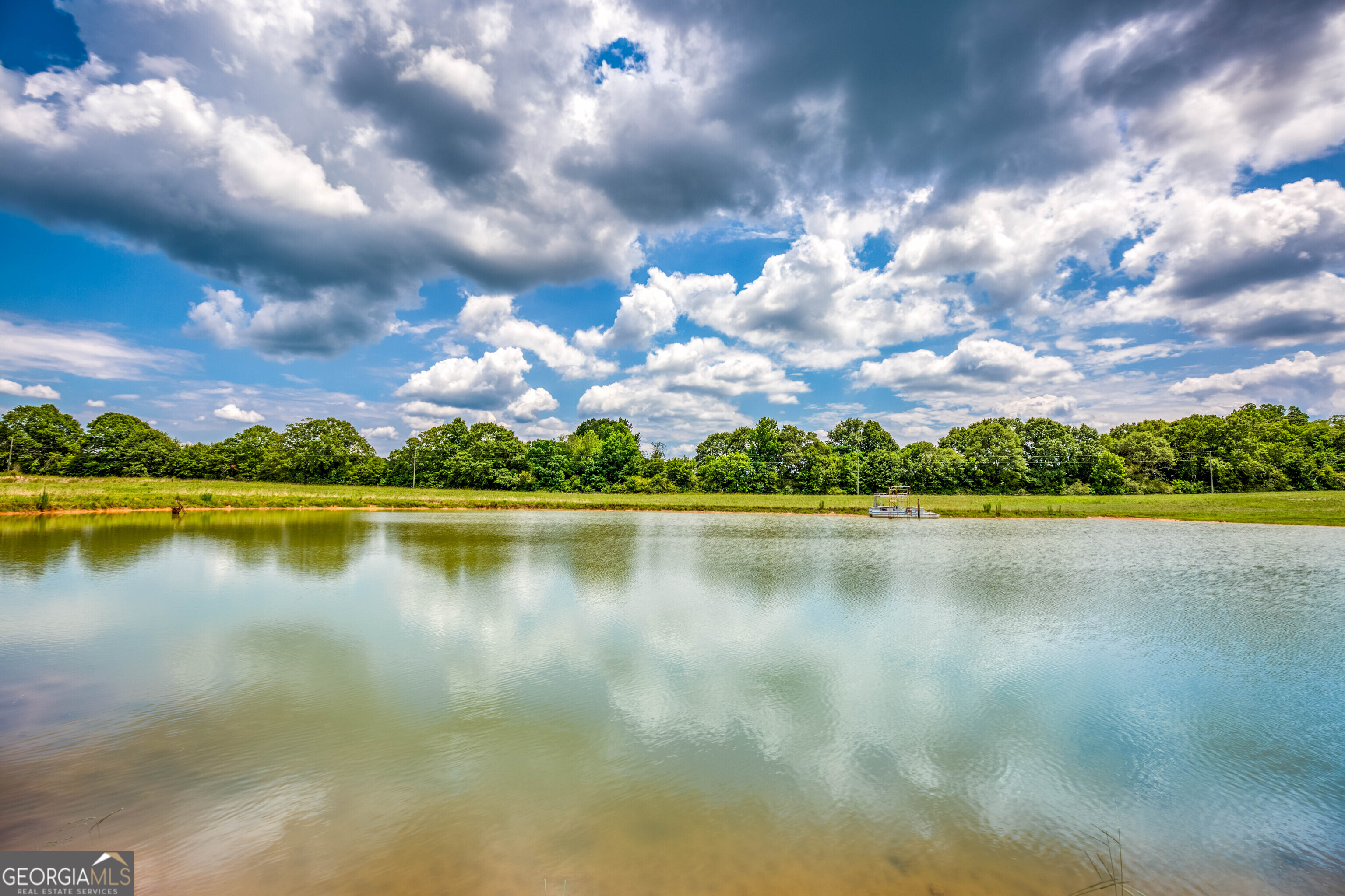 1811 Michael Road Northwest Monroe, GA 30656 - Photo 10 of 43 a view of a lake in front of house