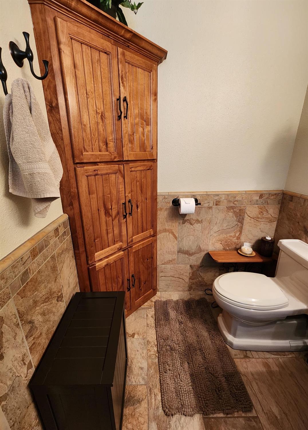 28903 Limestone Circle Coarsegold, CA 93614 - Photo 27 of 59 a bathroom with a toilet and a shower