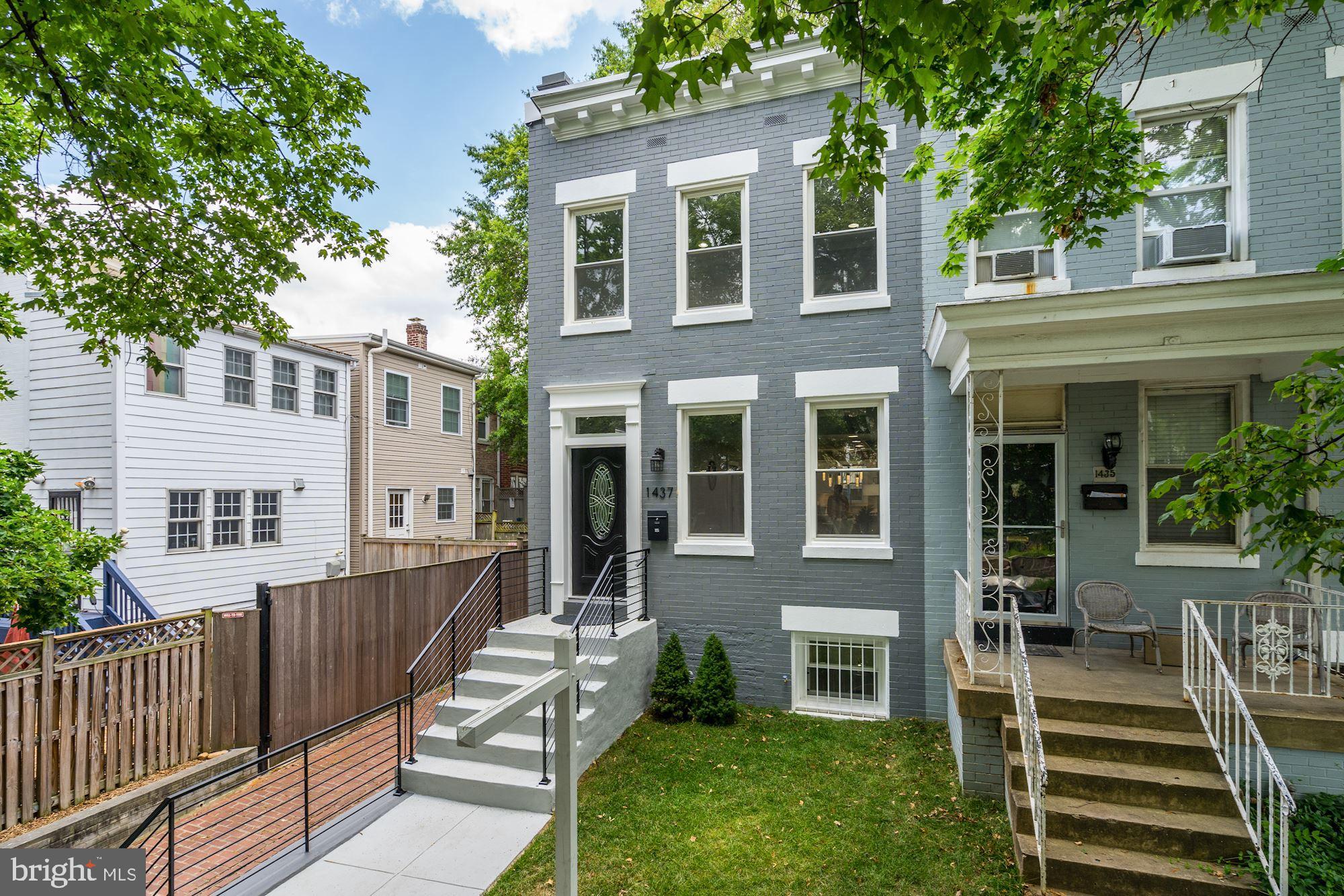 1437 E Street Northeast Washington, DC 20002 - Photo 2 of 39 front view of a house with a yard