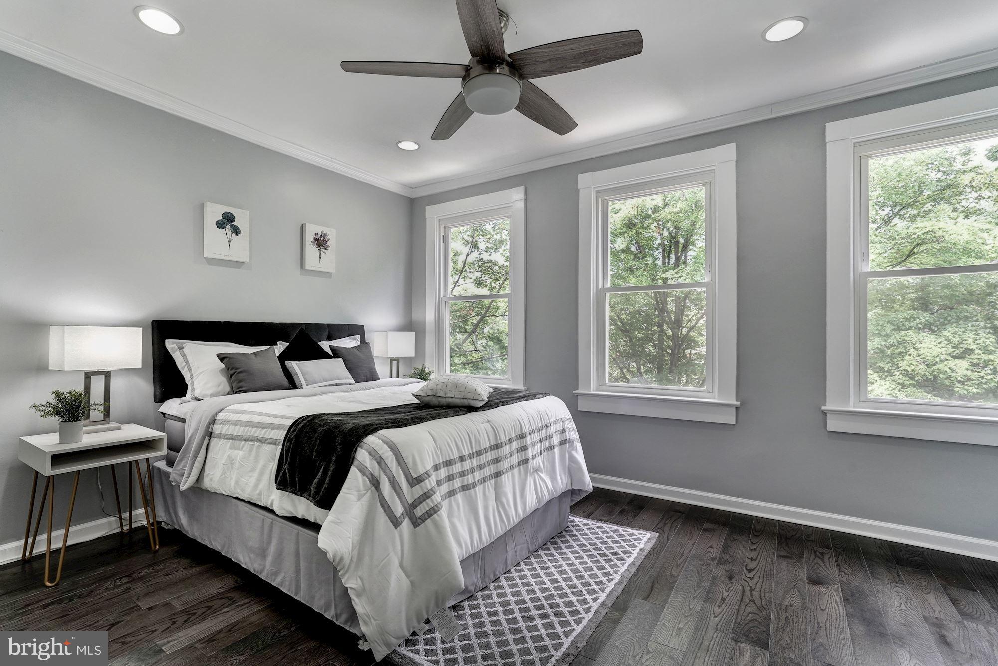 1437 E Street Northeast Washington, DC 20002 - Photo 16 of 39 a bedroom with bed and window