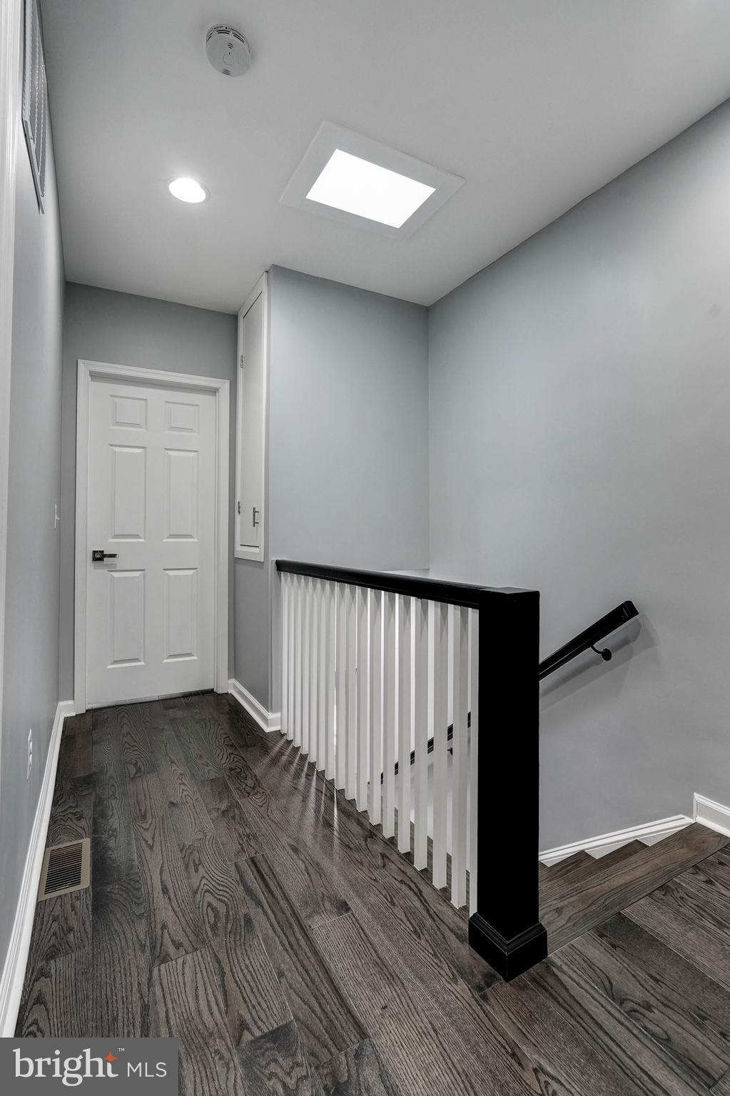 1437 E Street Northeast Washington, DC 20002 - Photo 21 of 39 a view of a hallway with wooden floor