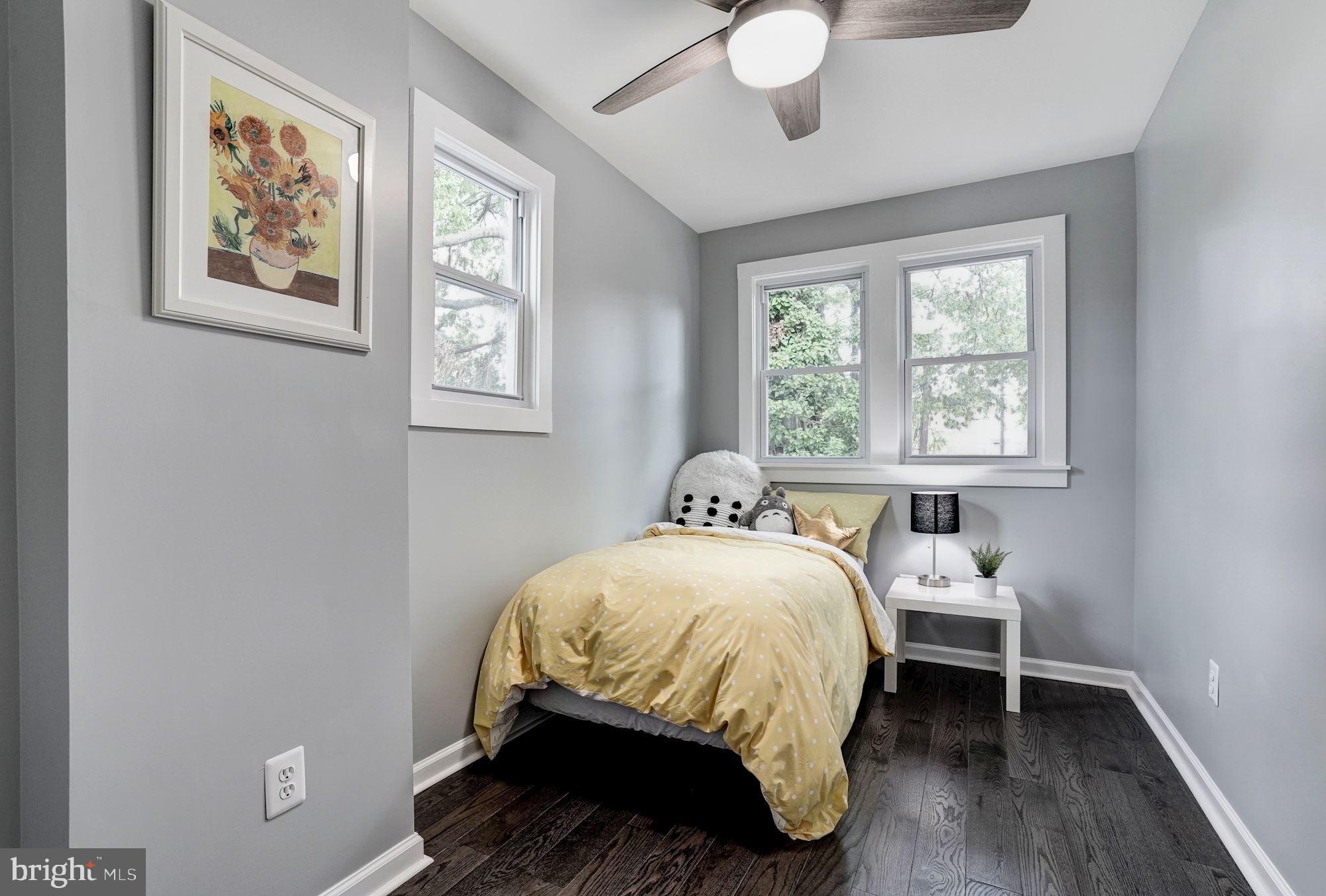 1437 E Street Northeast Washington, DC 20002 - Photo 22 of 39 a bedroom with a bed and a window