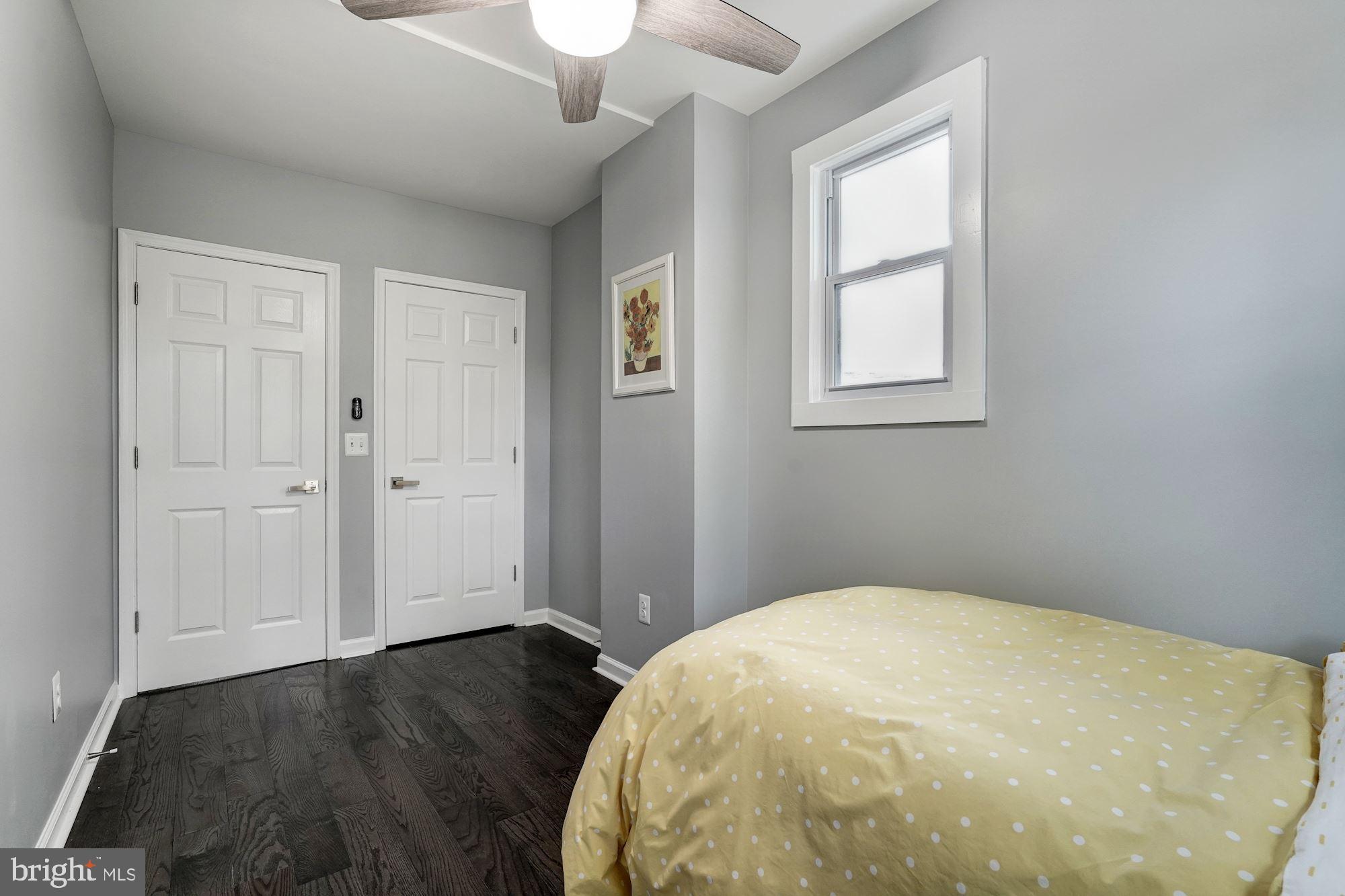 1437 E Street Northeast Washington, DC 20002 - Photo 23 of 39 wooden floor in an empty room with a window