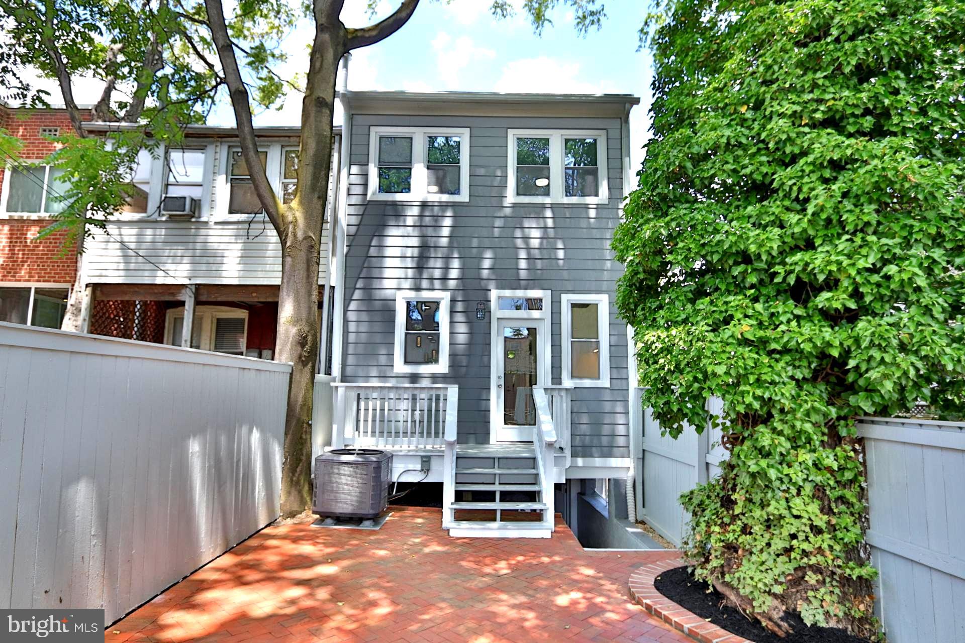 1437 E Street Northeast Washington, DC 20002 - Photo 38 of 39 a front view of a house with a yard