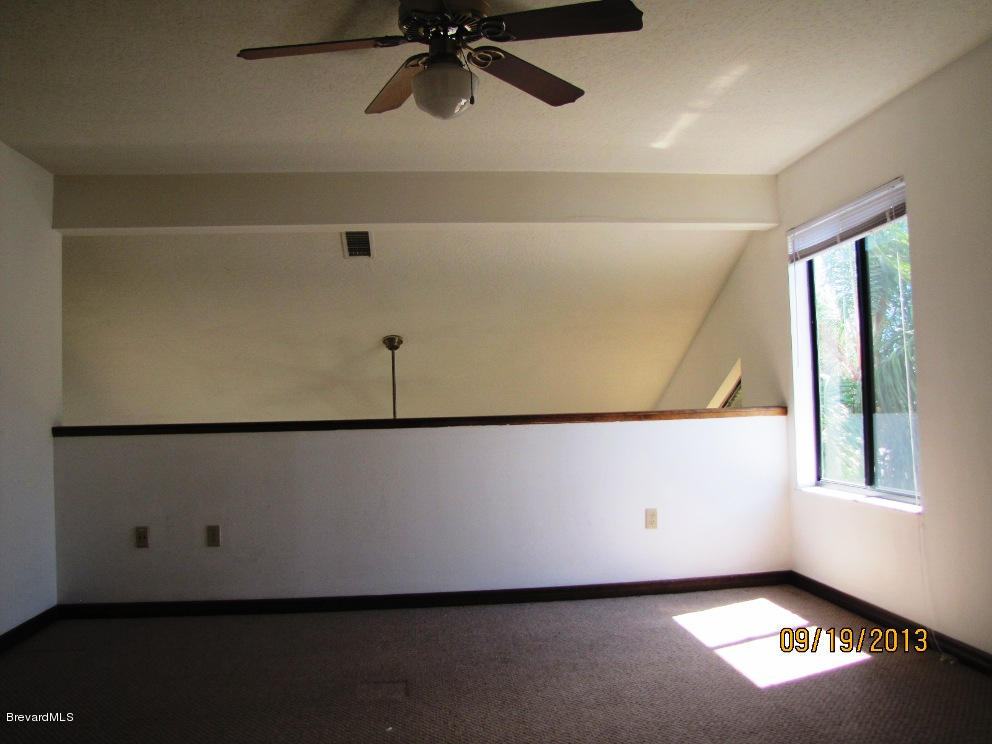 1319 George Edwards Court Merritt Island, FL 32953 - Photo 10 of 10 MASTER LOFT BEDROOM V4