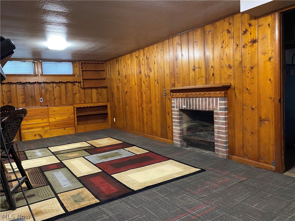 16024 Brewster Road Cleveland, OH 44112 - Photo 3 of 27 Original Knotty Pine, Wood burning fireplace, Owner never used. Bar can be moved