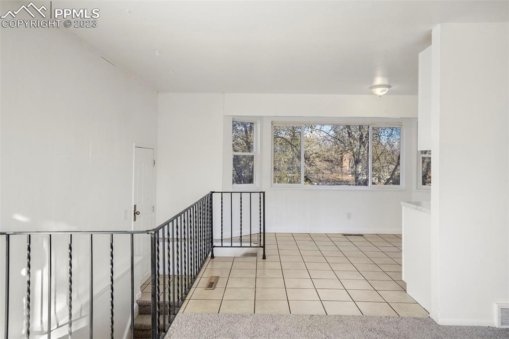 1159 Peterson Road Colorado Springs, CO 80915 - Photo 6 of 22 a view of a hallway