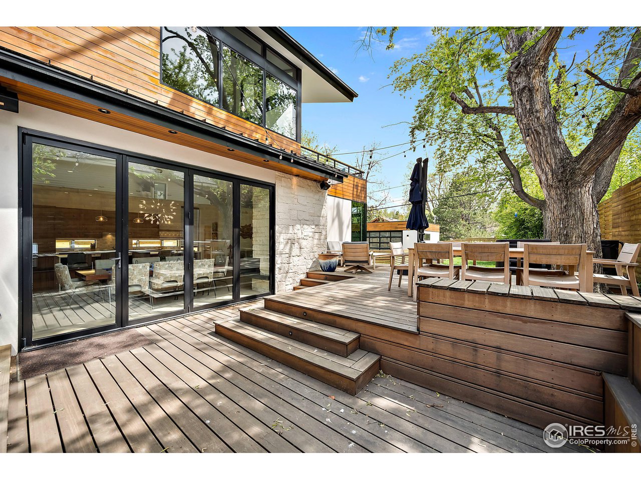 550 Iris Avenue Boulder, CO 80304 - Photo 16 of 40 a view of a two chairs in the balcony