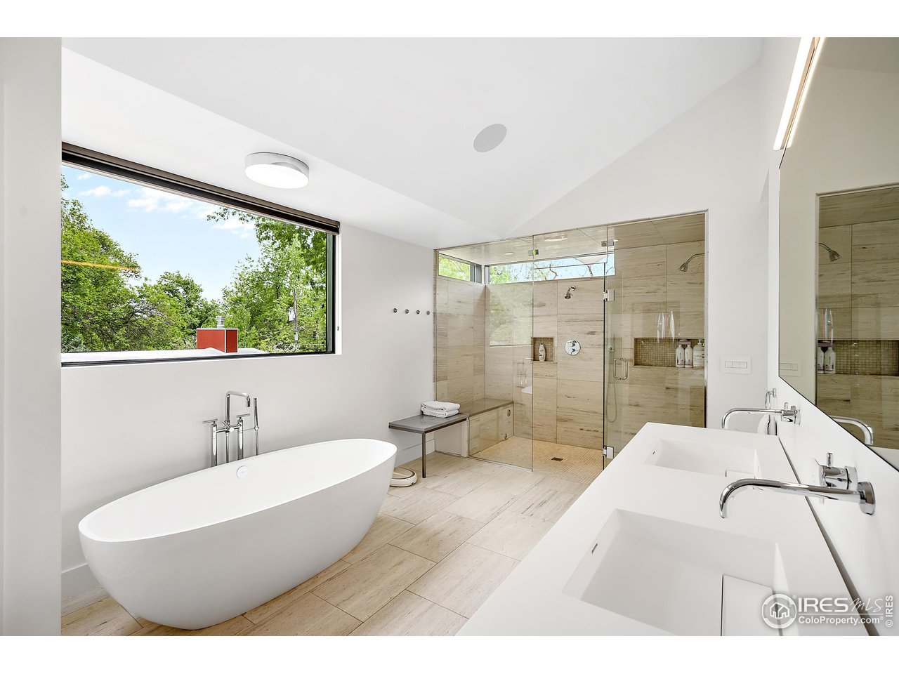 550 Iris Avenue Boulder, CO 80304 - Photo 21 of 40 a living room with furniture and a large window