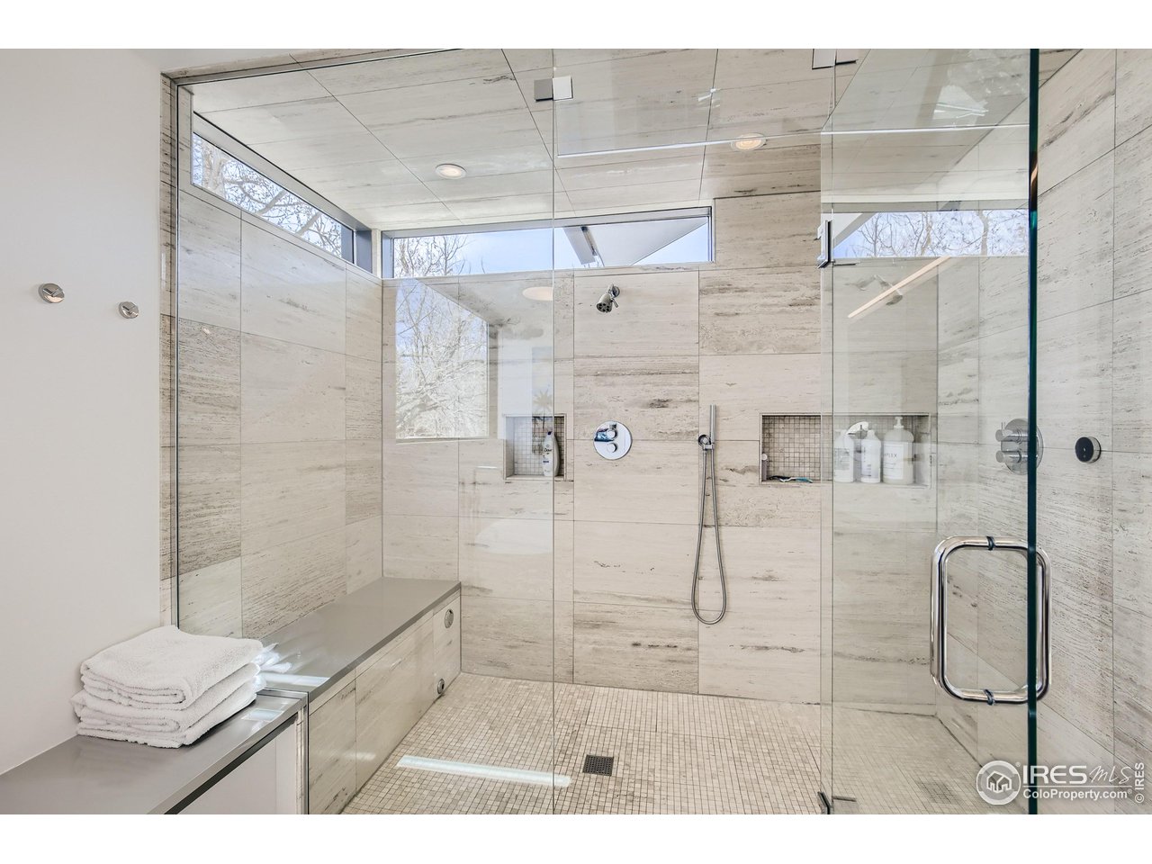 550 Iris Avenue Boulder, CO 80304 - Photo 22 of 40 a bathroom with a glass shower door