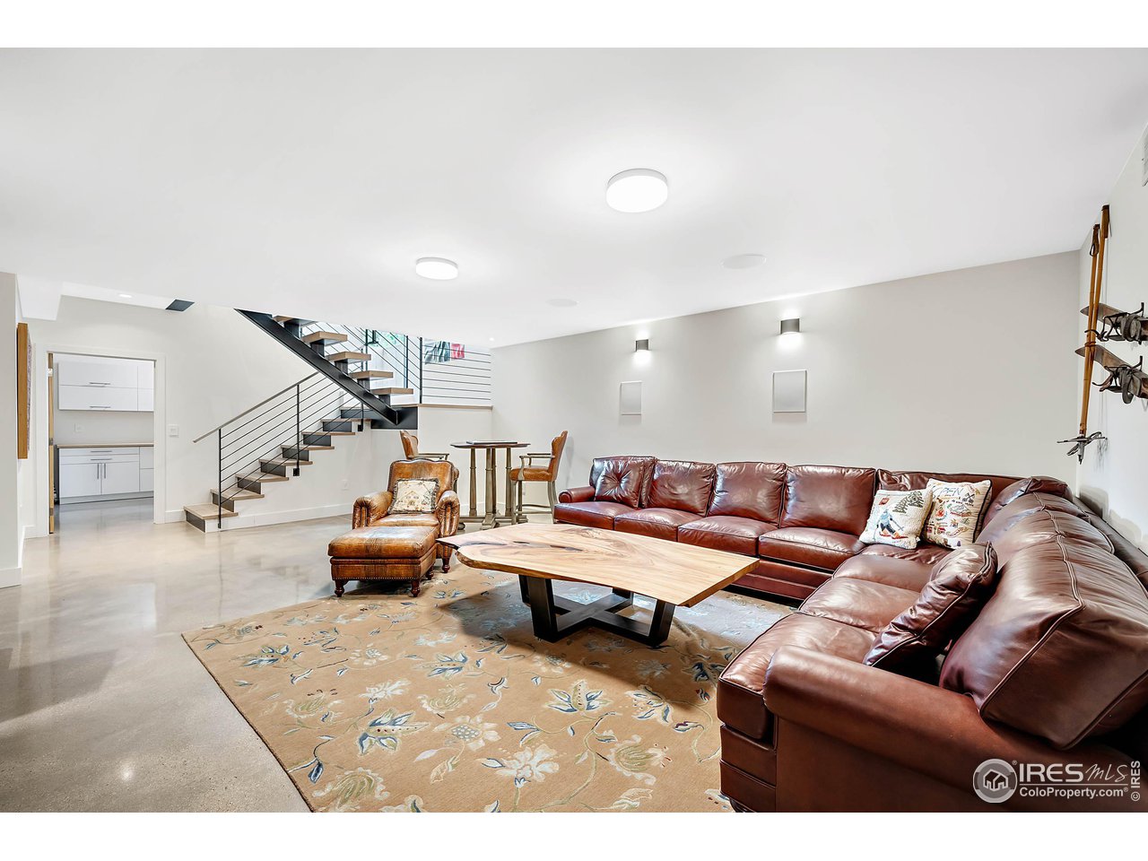 550 Iris Avenue Boulder, CO 80304 - Photo 30 of 40 a living room with furniture and stairs