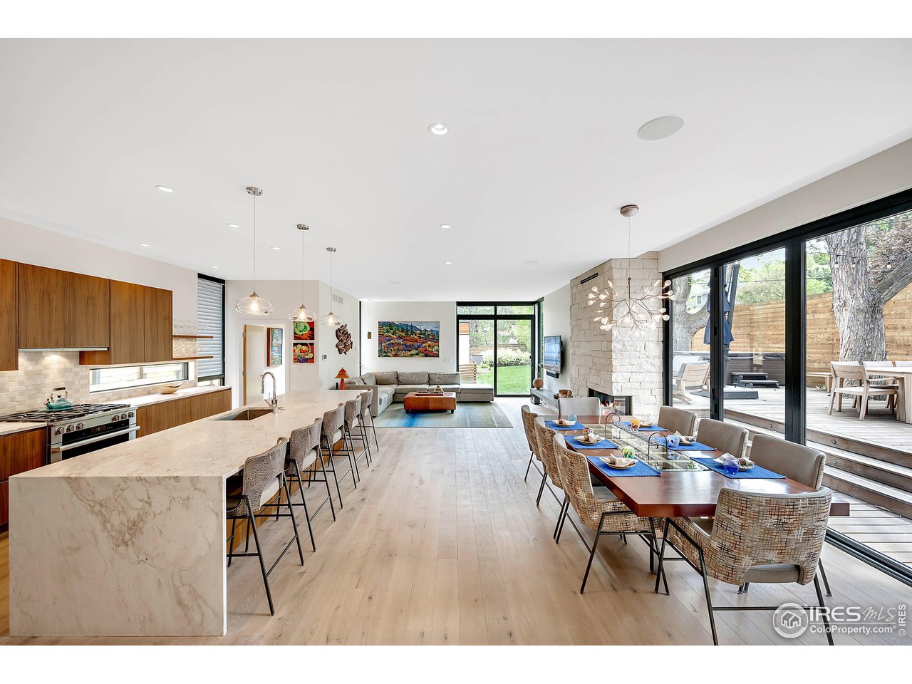 550 Iris Avenue Boulder, CO 80304 - Photo 3 of 40 a living room with furniture and a flat screen tv