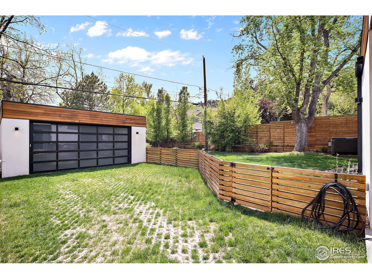 550 Iris Avenue Boulder, CO 80304 - Photo 37 of 40 a view of a backyard with a garden and deck