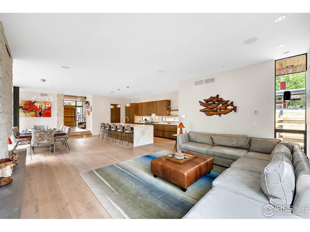 550 Iris Avenue Boulder, CO 80304 - Photo 8 of 40 a living room with furniture and wooden floor