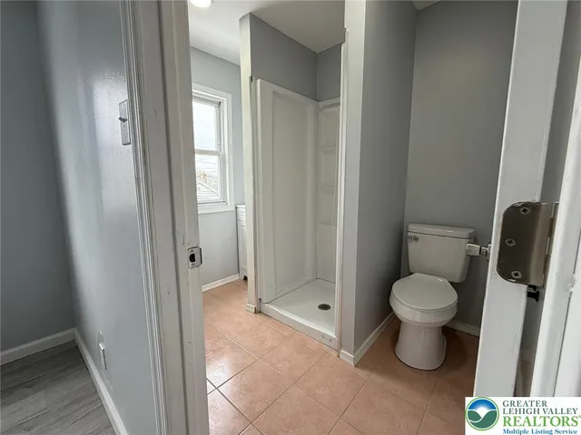 a bathroom with a toilet and a sink