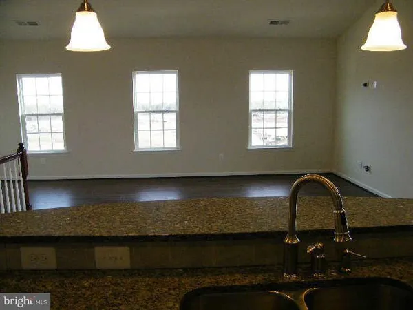 a front view of a house with swimming pool and window