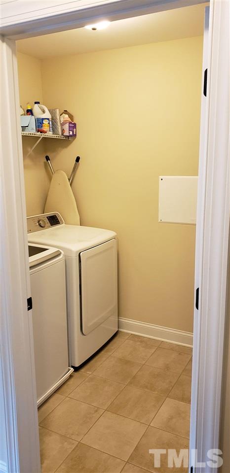 2021 Sageleaf Court Raleigh, NC 27603 - Photo 18 of 20 a utility room with dryer and washer