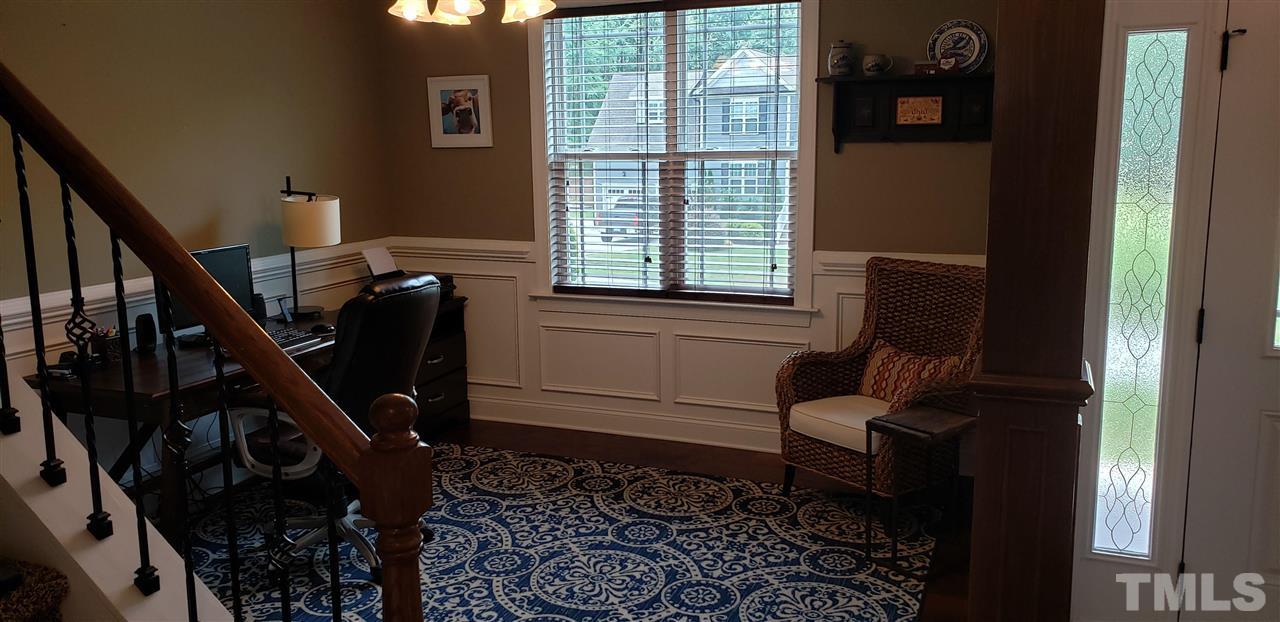 2021 Sageleaf Court Raleigh, NC 27603 - Photo 4 of 20 a living room with furniture and a window