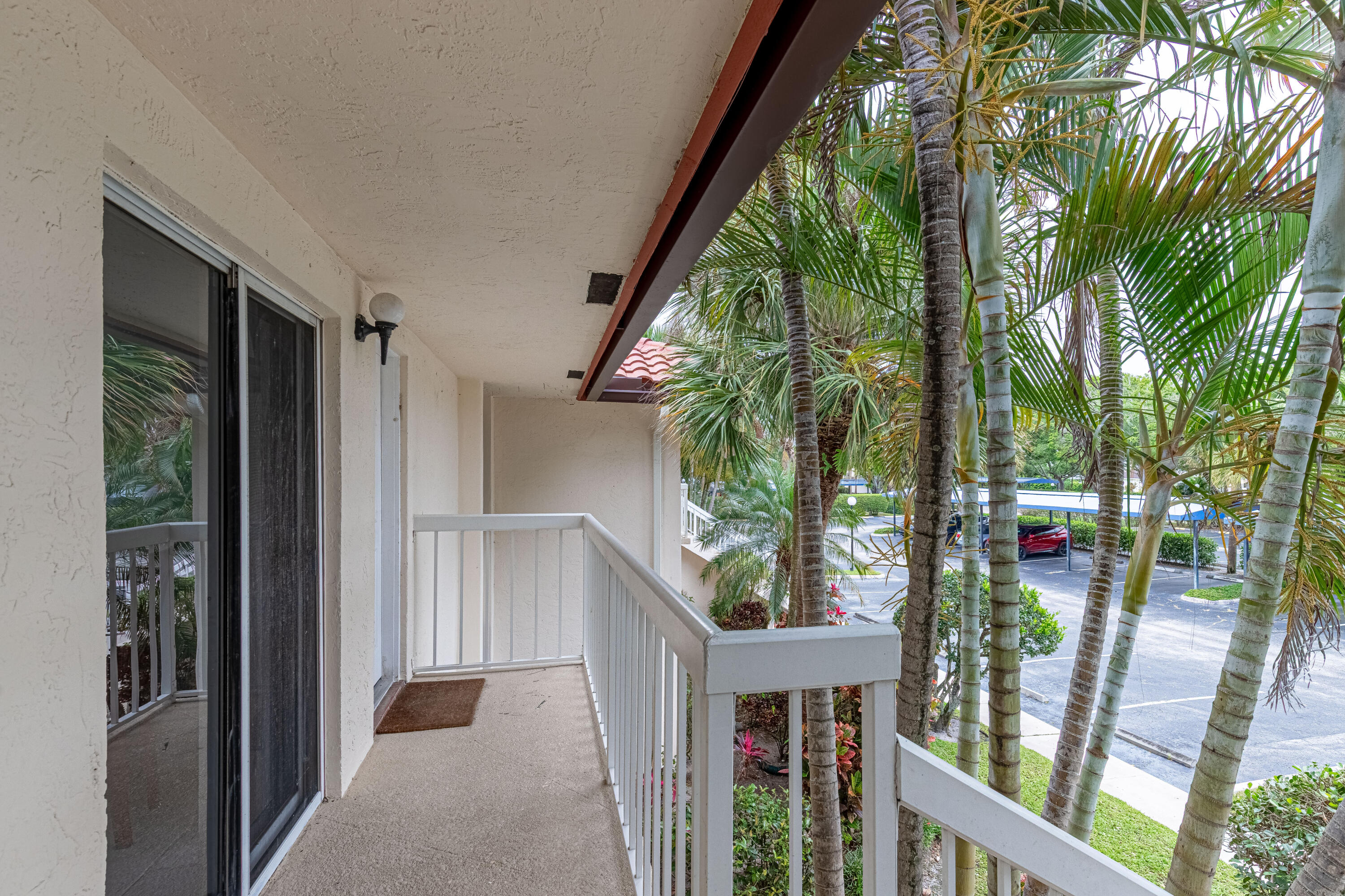 260 Northwest 67th Street, Unit A203 Boca Raton, FL 33487 - Photo 2 of 25 Front Door-Balcony