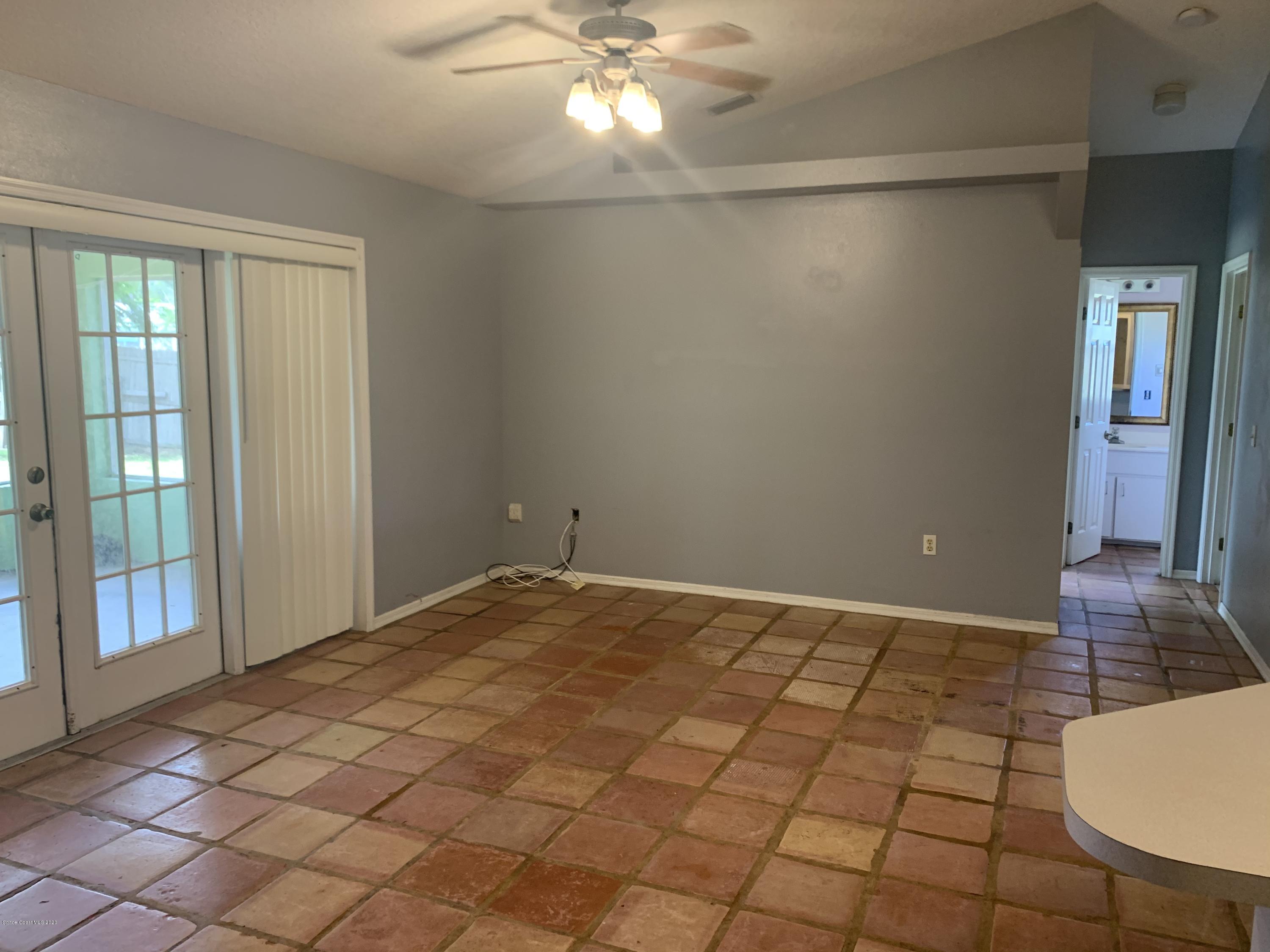 6148 Corning Road Cocoa, FL 32927 - Photo 11 of 22 Great room & hall