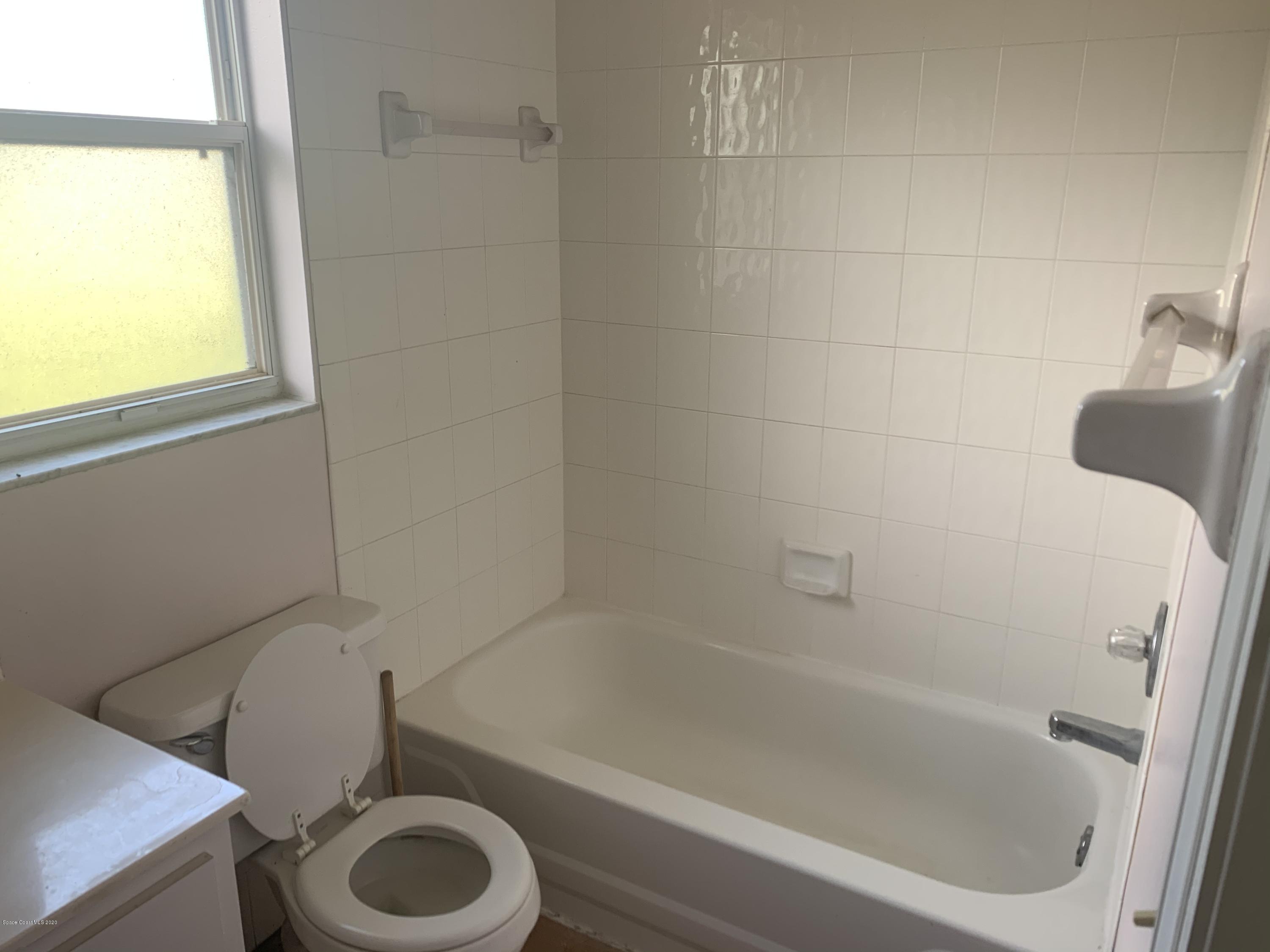 6148 Corning Road Cocoa, FL 32927 - Photo 13 of 22 Hall bath