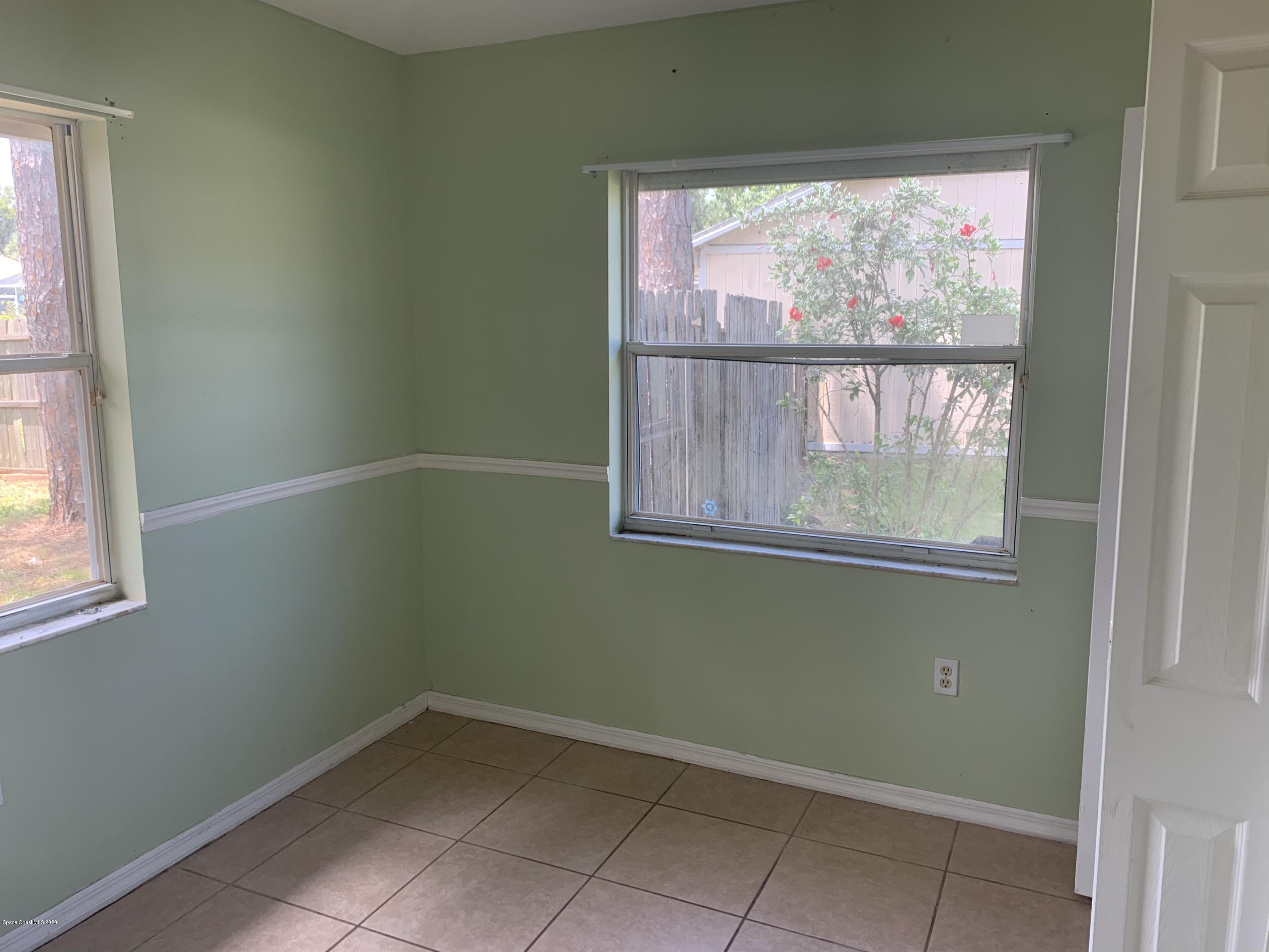 6148 Corning Road Cocoa, FL 32927 - Photo 14 of 22 Back bedroom