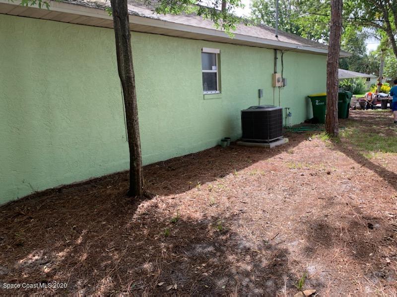 6148 Corning Road Cocoa, FL 32927 - Photo 22 of 22 Left side of house from rear