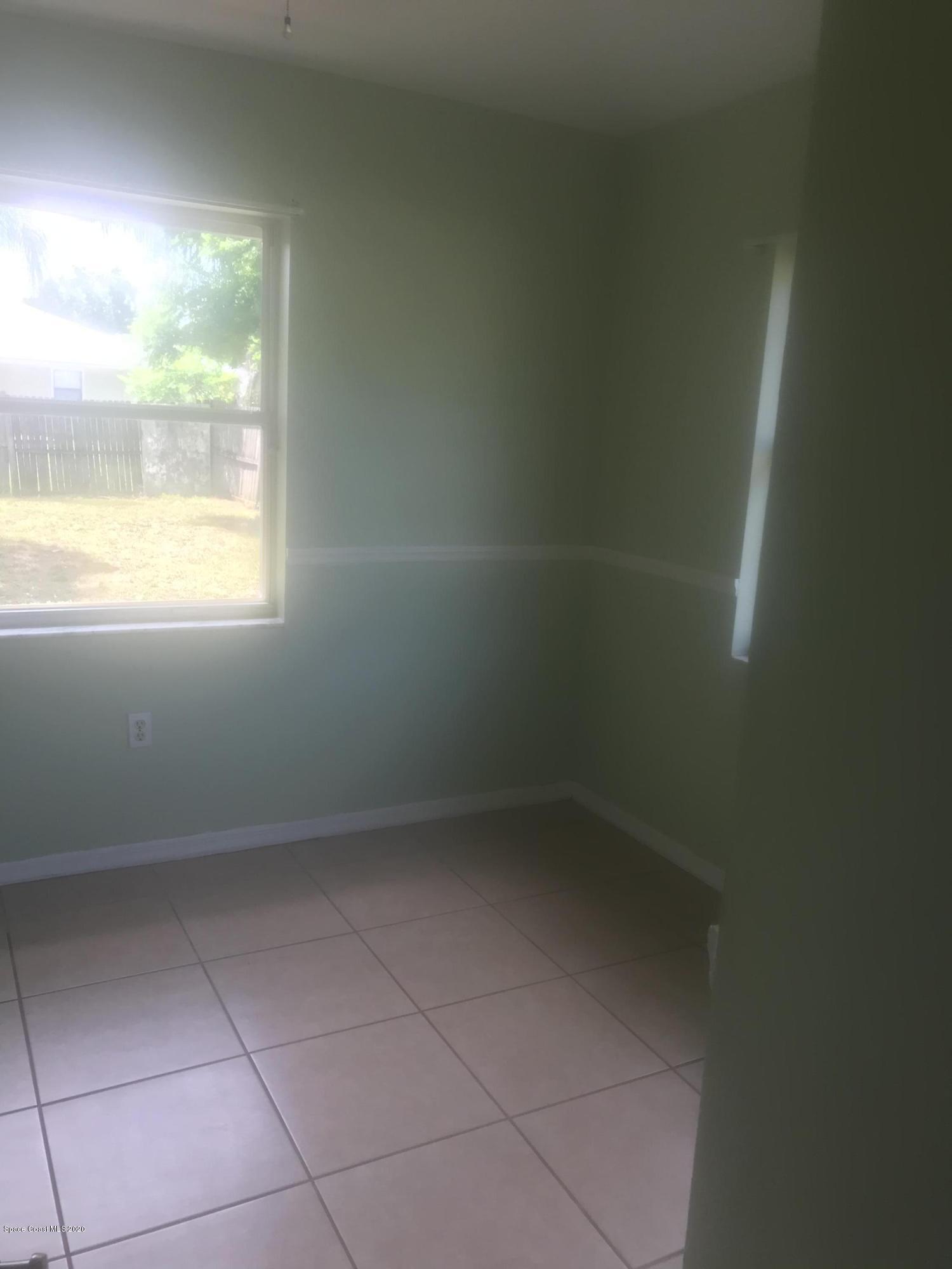 6148 Corning Road Cocoa, FL 32927 - Photo 4 of 22 Back bedroom
