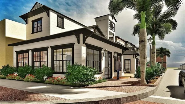 a front view of a house with a yard garage and outdoor seating