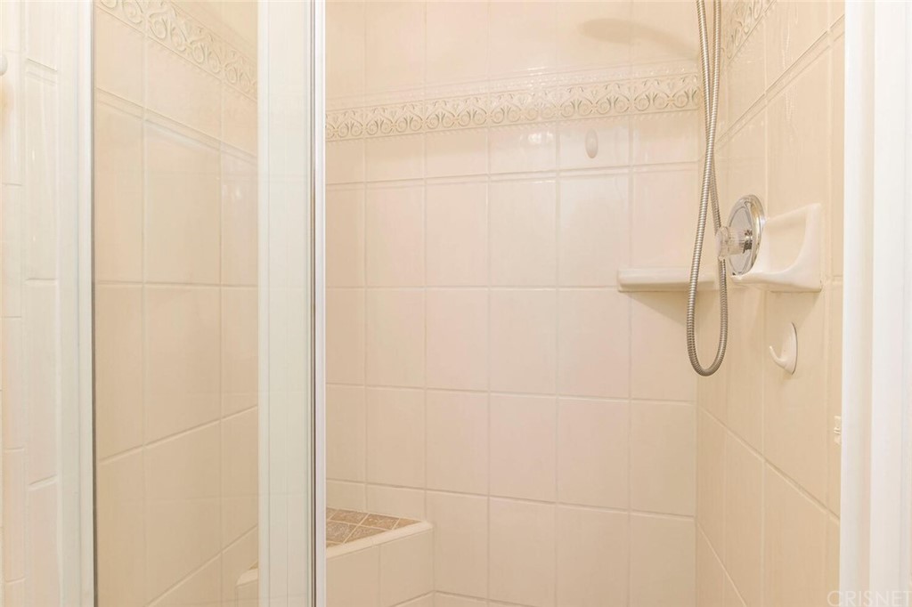 27003 Rio Prado Drive Valencia, CA 91354 - Photo 16 of 27 a bathroom with a shower