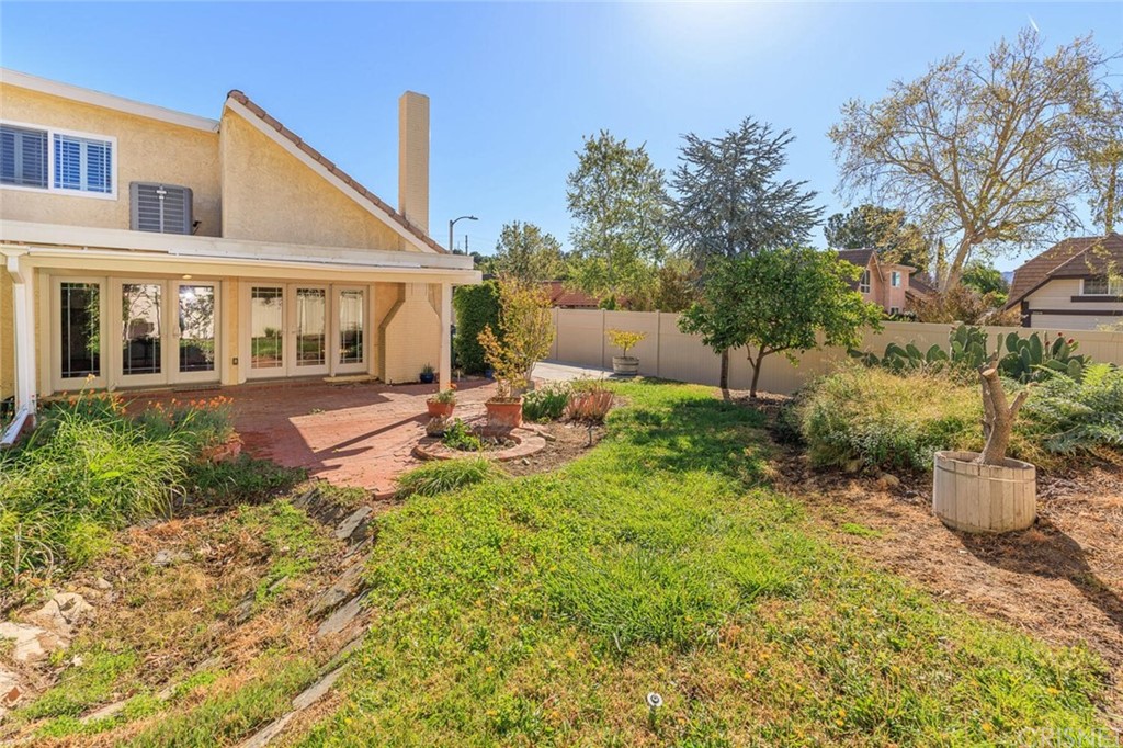 27003 Rio Prado Drive Valencia, CA 91354 - Photo 22 of 27 a view of a house with backyard and sitting area