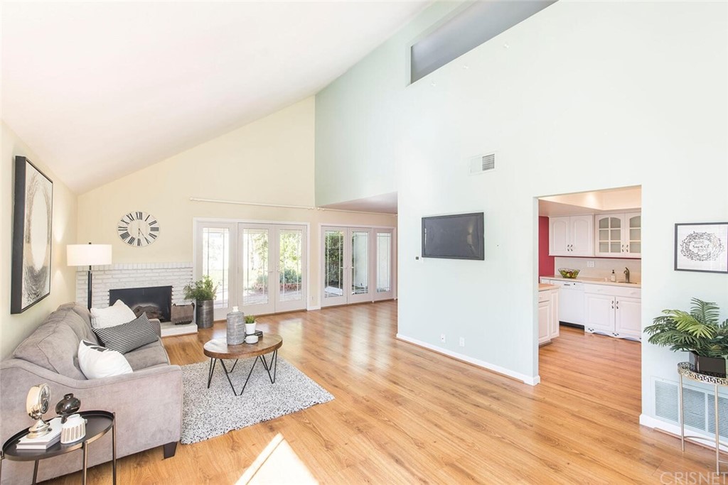 27003 Rio Prado Drive Valencia, CA 91354 - Photo 5 of 27 a living room with furniture and a wooden floor
