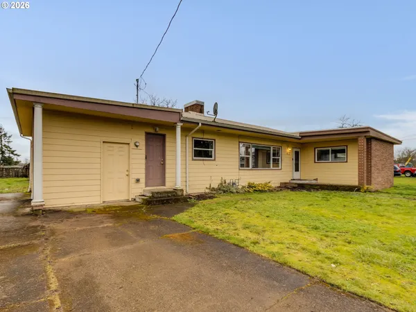 a front of a house with a yard