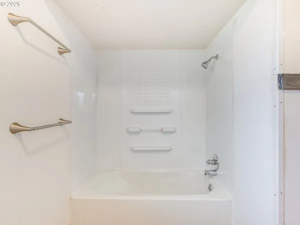 a bathroom with a bathtub